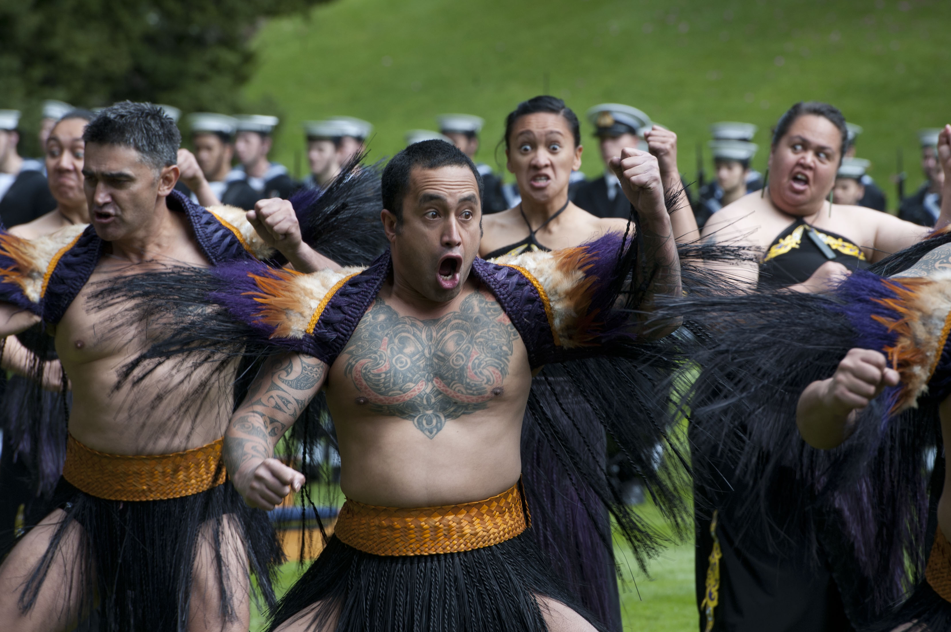 Maori people performing a haka dance